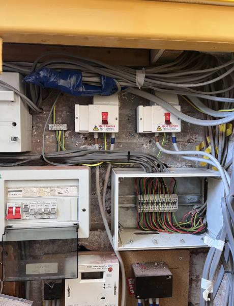 Older switch-fuses, consumer unit and junction box before an upgrade